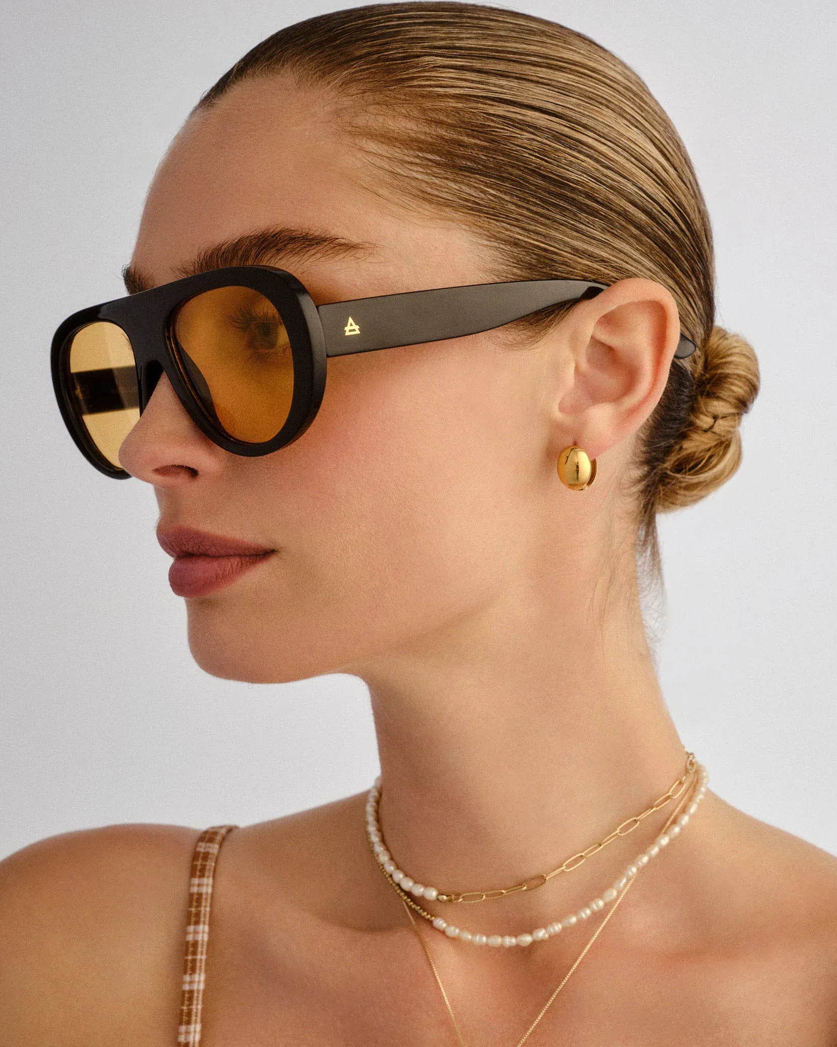 Aire AIRE Satellite Sunnies - Black Amber Tint AIR2612346 Aire Whirlpool Sunnies - Black Splash Swimwear Sunnies 9324976443175