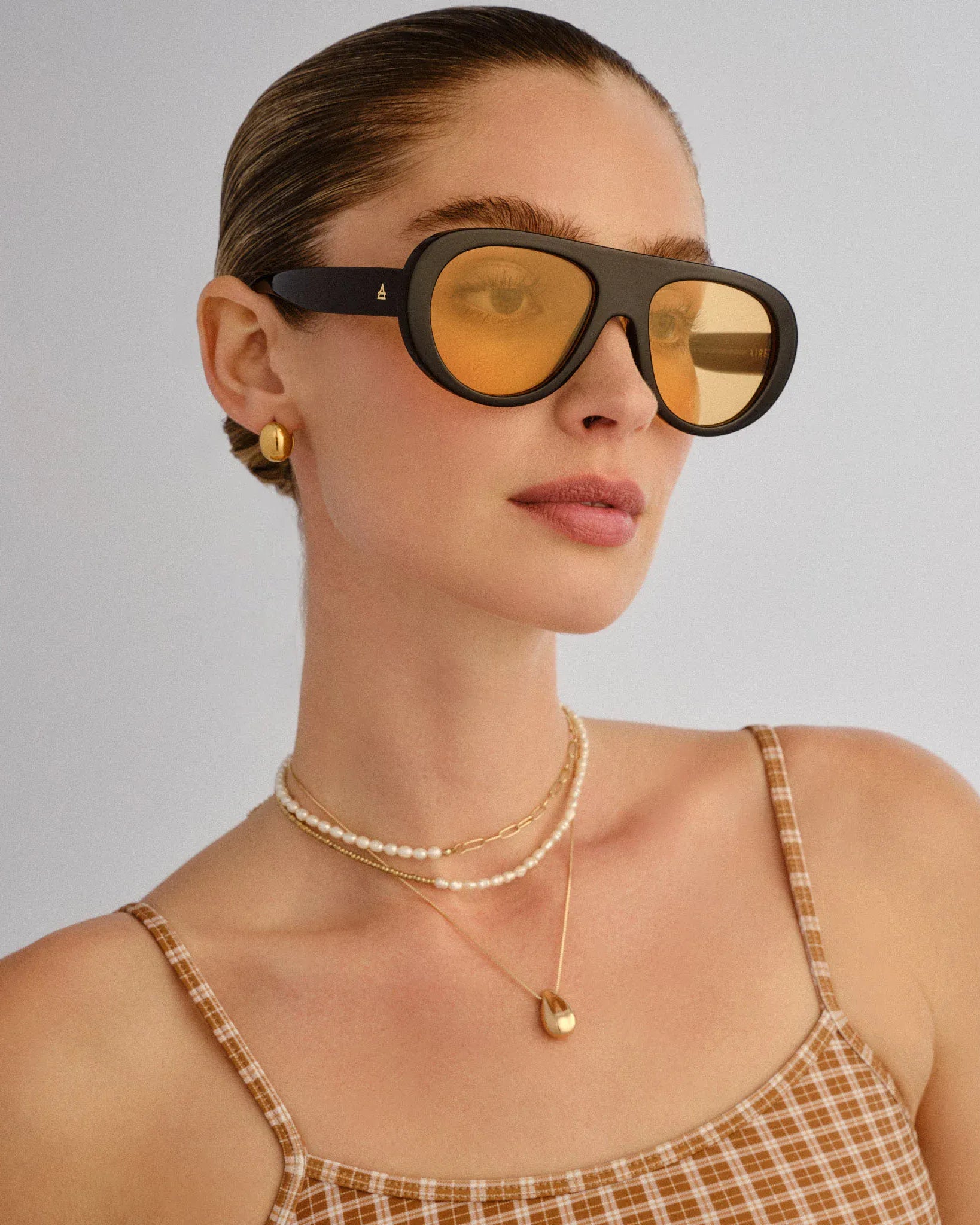 Aire AIRE Satellite Sunnies - Black Amber Tint AIR2612346 Aire Whirlpool Sunnies - Black Splash Swimwear Sunnies 9324976443175