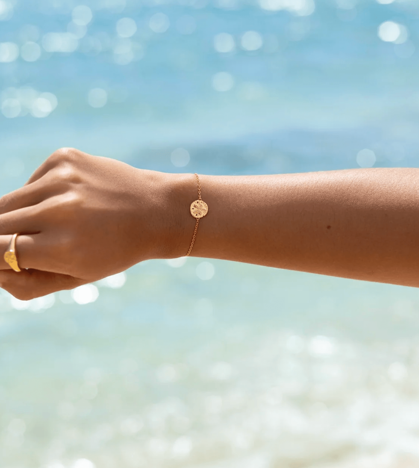 Malakai The Label Sand Dollar Bracelet - Gold CCB-901-GLD Sand Dollar Bracelet - Gold Splash Swimwear Accessories 47831971