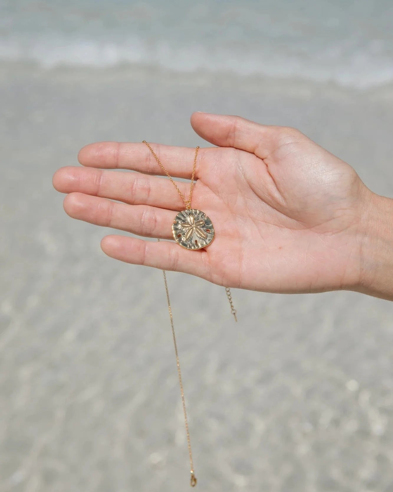 Malakai The Label Sand Dollar Necklace - Gold CCE-902-GLD Sand Dollar Necklace - Gold Splash Swimwear Accessories 79944611