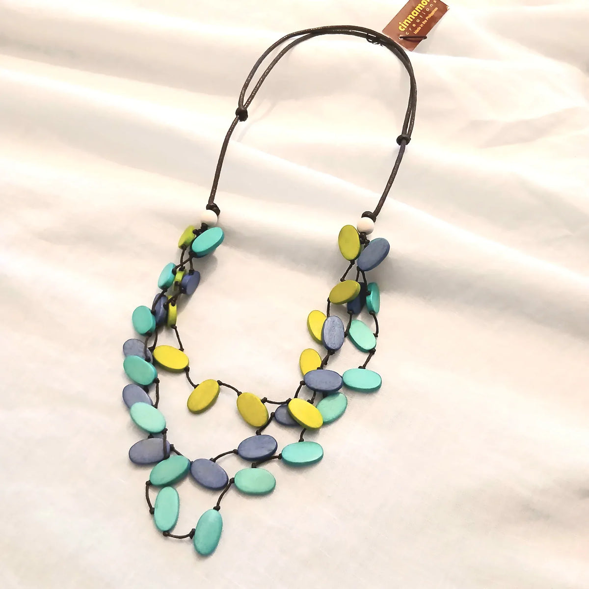 Cinnamon Creations Cinnamon Leaf Shape Woodbead Necklace n7-1497Fgt Cinnamon Leaf Shape Woodbead Necklace Splash Swimwear Accessories 1000030587