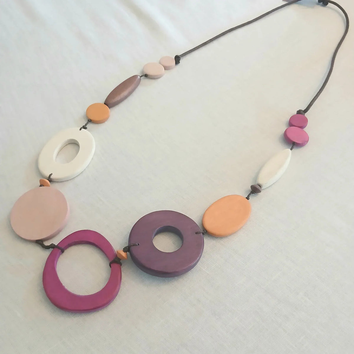 Cinnamon Creations Cinnamon Multicolour Wood Circle Bead Necklace n7-1358xy Cinnamon Multicolour Wood Circle Bead Necklace Splash Swimwear Accessories 1000030595