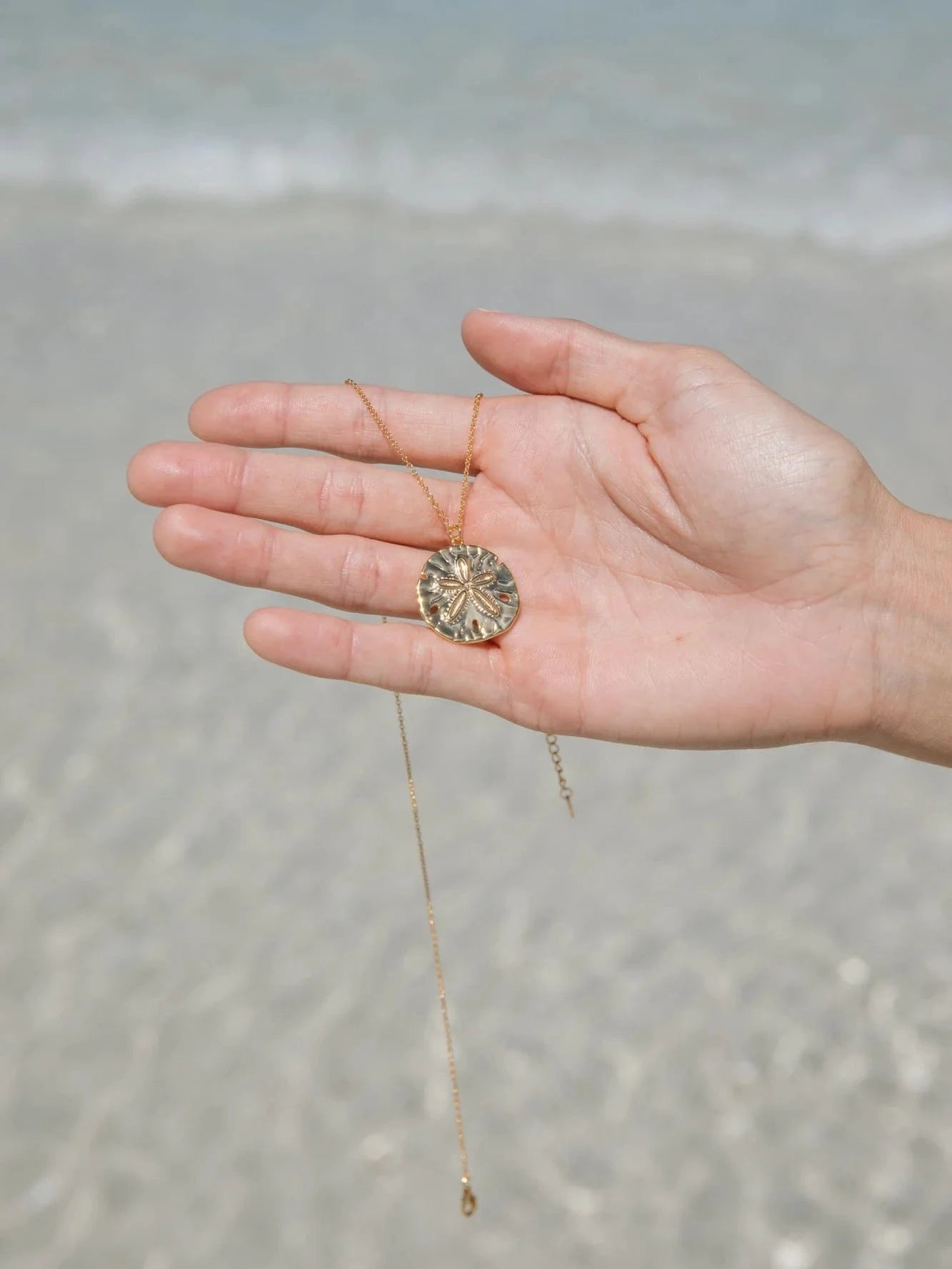 Malakai The Label Sand Dollar Necklace - Gold CCE-902-GLD Sand Dollar Necklace - Gold Splash Swimwear Accessories 79944611