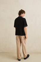 Rhythm Rhythm Diego Short Sleeve Shirt - Black Rhythm Diego Short Sleeve Shirt - Black Splash Swimwear Tops
