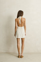 Rhythm Womens Rhythm Maisy Halter Mini Dress - Cream Rhythm Maisy Halter Mini Dress Cream Splash Swimwear Dresses